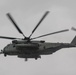 A U.S. Marine Corps CH-53E Super Stallion participates in helo-cast training during RIMPAC 2022