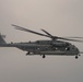 A U.S. Marine Corps CH-53E Super Stallion participates in helo-cast training during RIMPAC 2022