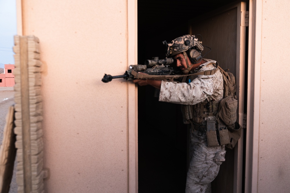 Marines conduct urban terrain combat training during MWX 3-22