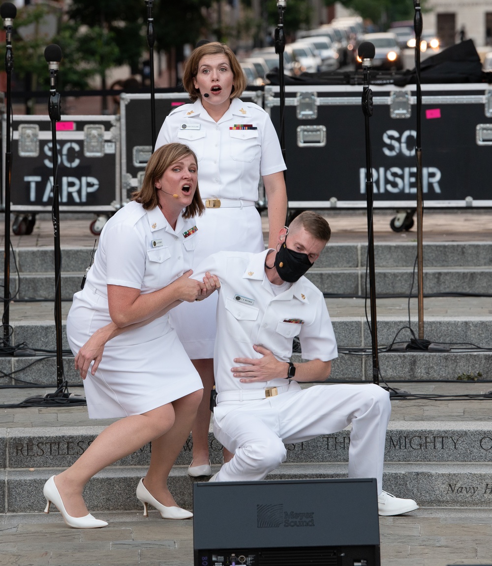 U.S. Navy Band Sea Chanters Chorus performs at the U.S. Navy Memorial Plaza