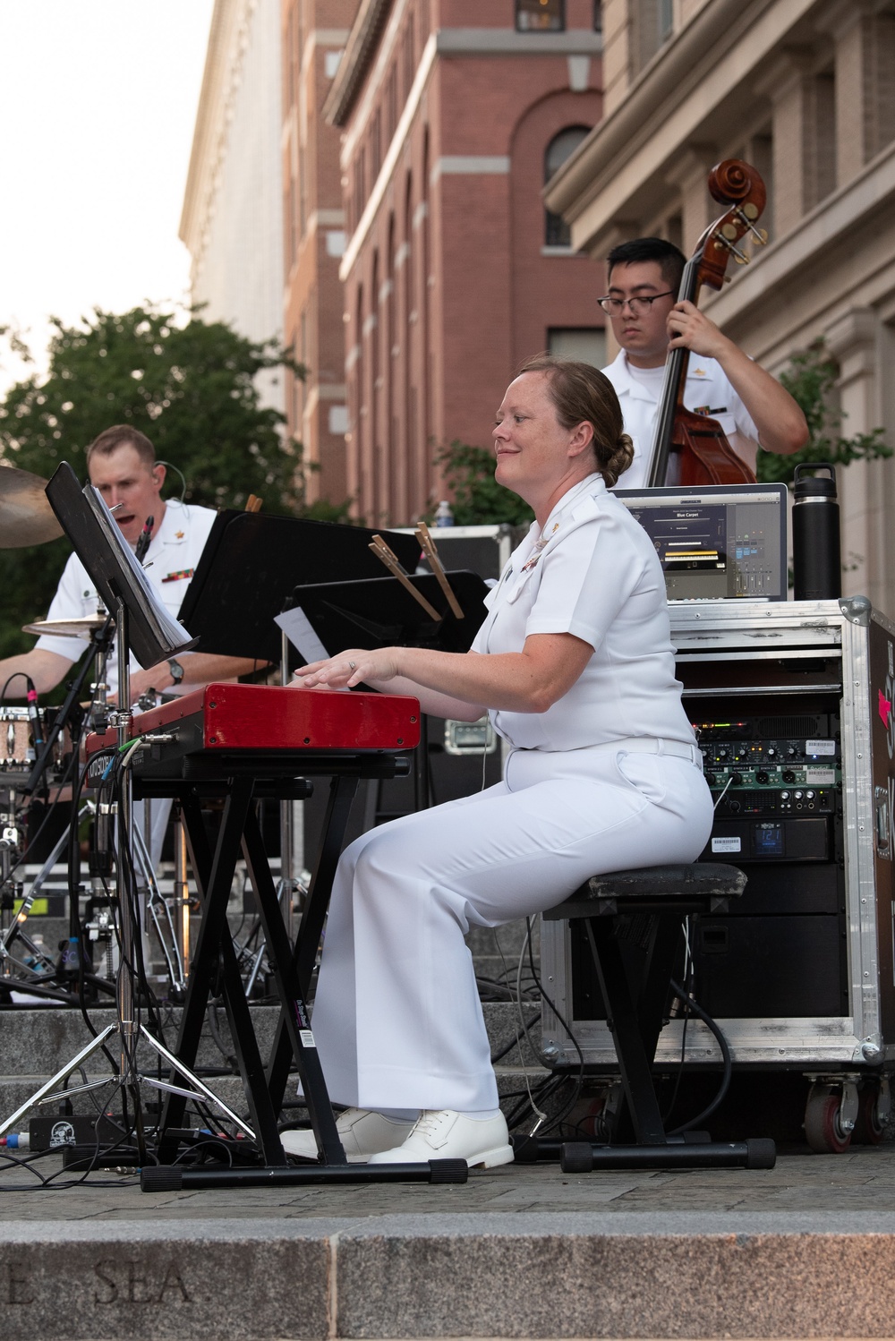 U.S. Navy Band Sea Chanters Chorus performs at the U.S. Navy Memorial Plaza