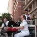 U.S. Navy Band Sea Chanters Chorus performs at the U.S. Navy Memorial Plaza