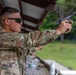 Cpl. Anton Shekhalevich fires a Colt 1911 pistol