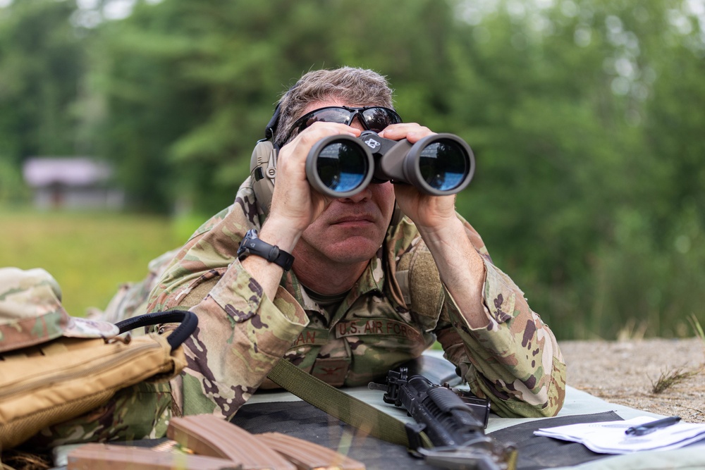 Col. Brent Dishman checks his target