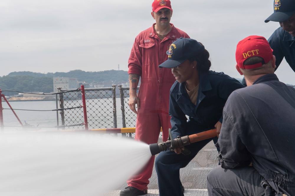 Sailors Practice DC Drills Onboard USS America