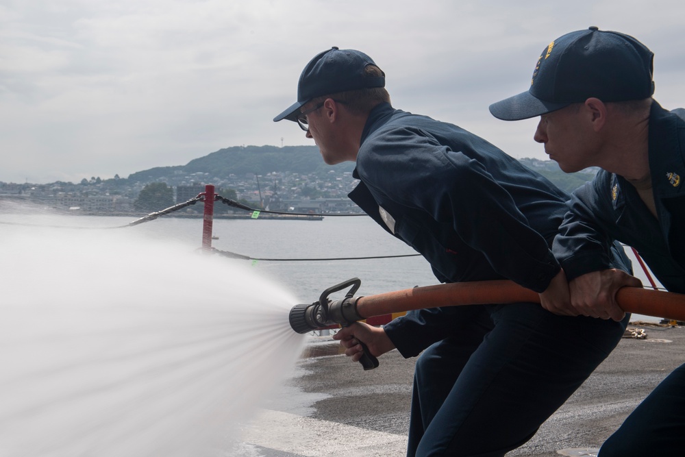 Sailors Practice DC Drills Onboard USS America