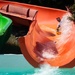 A U.S. Navy Sailor, assigned to the aircraft carrier USS John C. Stennis (CVN 74), slides down a waterslide at the John C. Stennis command picnic, at Oceanbreeze Waterpark, in Virginia Beach, Virginia, July 21, 2022.