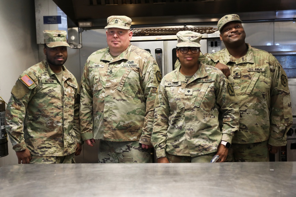 Culinary specialists prepares turkey dinner