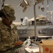 Culinary specialists prepares turkey dinner