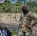 Soldiers of the 112th Field Artillery Regiment shoot 105mm Howitzers at XCTC