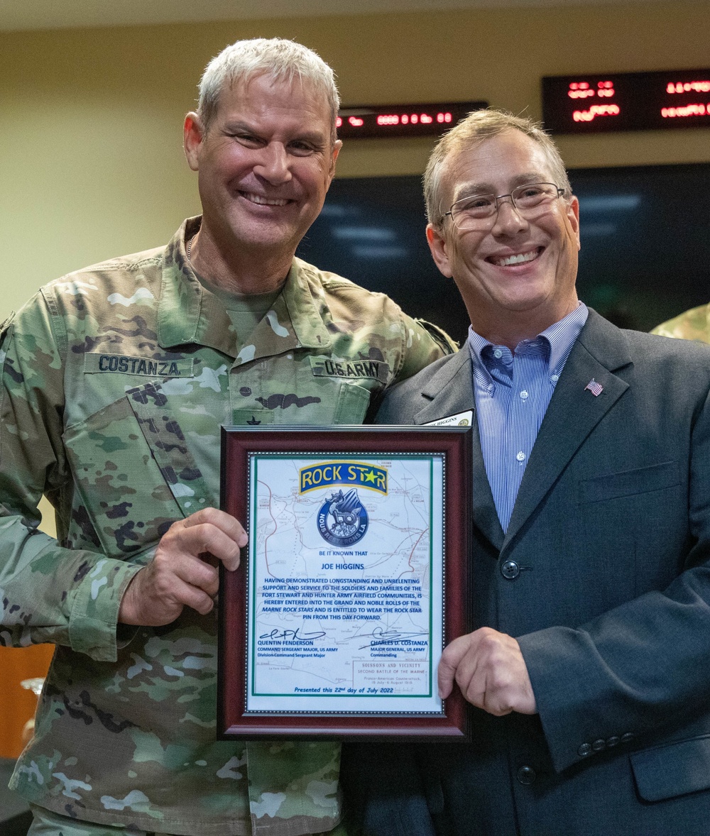 Maj. Gen. Charles Costanza awards Marne Rockstars