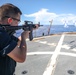 Midshipman Fires Rifle