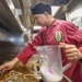 Culinary Specialist Cleans Grill