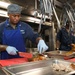 Culinary Specialist Cleans Grill