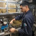 Food Service Assistant Cleans Cutlery