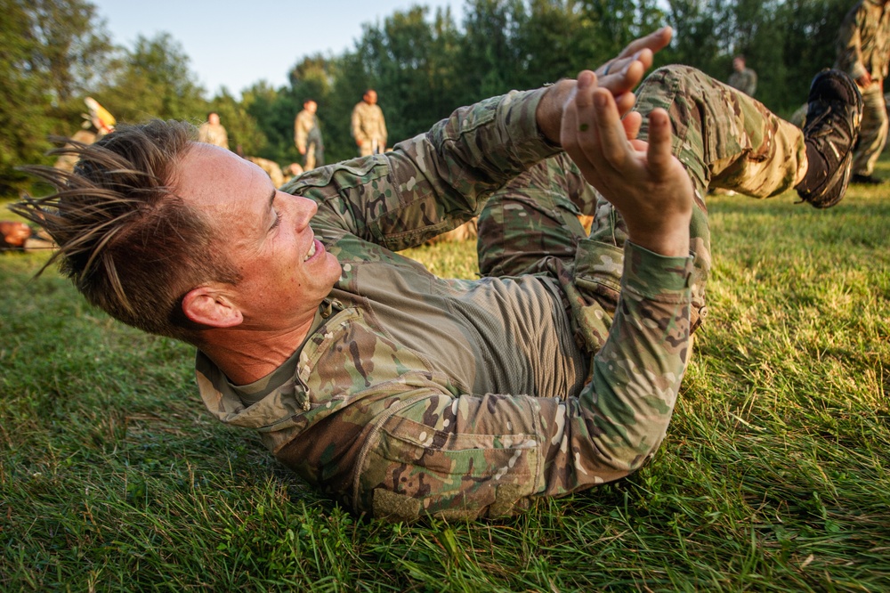 Visual Information Soldiers Conduct Combatives Training