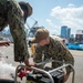 U.S. Navy Sailors prepare to test P-100 pump