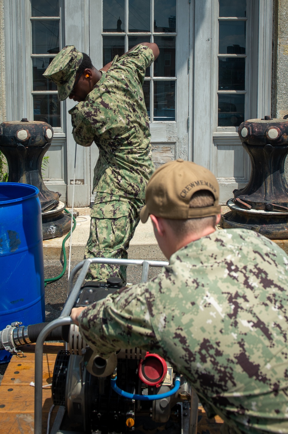 U.S. Navy Sailors prepare to test P-100 pump