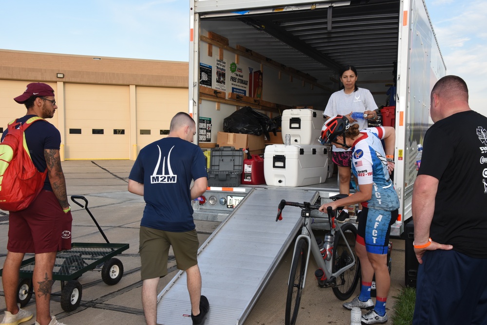 AFCT and support team members load equipment