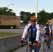 AFCT rides by 185th ARW’s sign