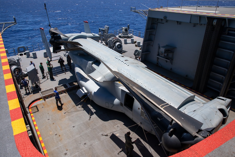 HMAS Canberra stows an Osprey for the first time at sea