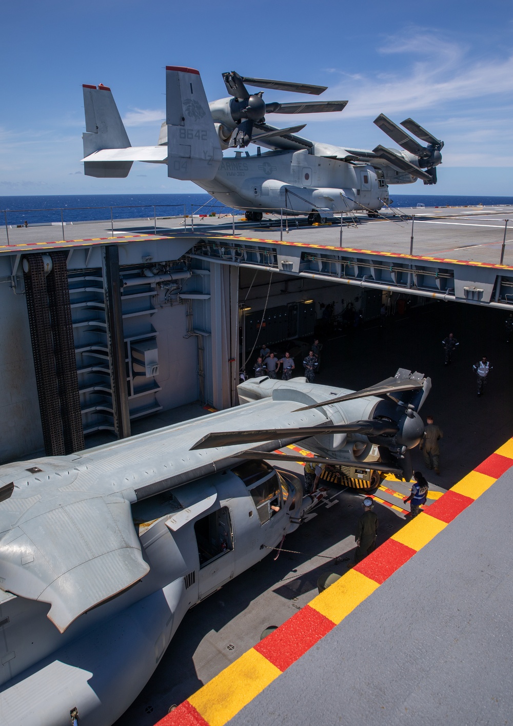 HMAS Canberra stows an Osprey for the first time at sea