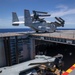 HMAS Canberra stows an Osprey for the first time at sea