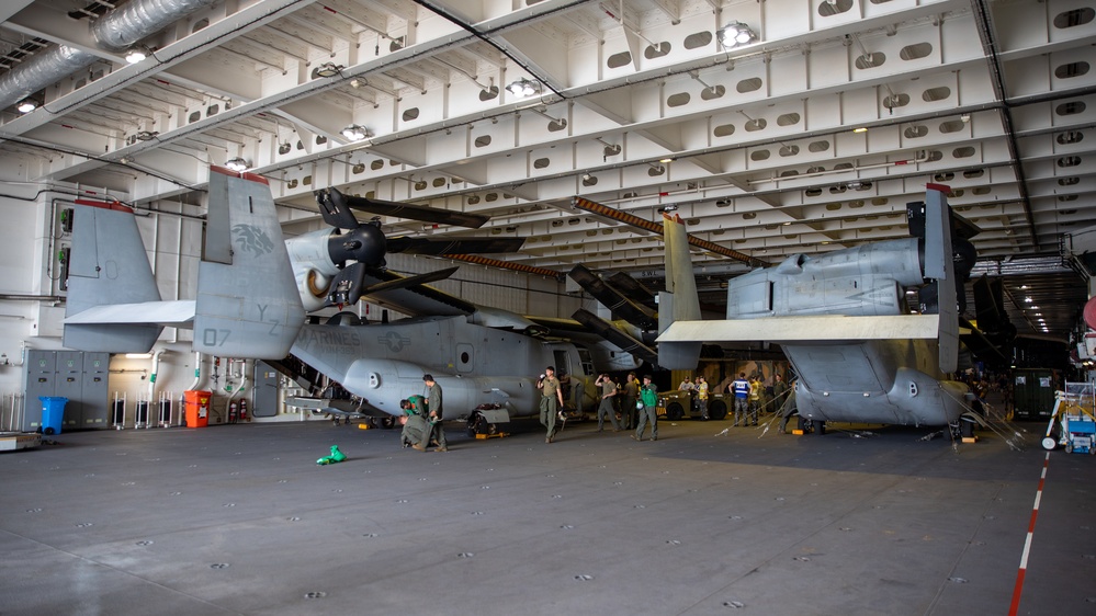 HMAS Canberra stows an Osprey for the first time at sea