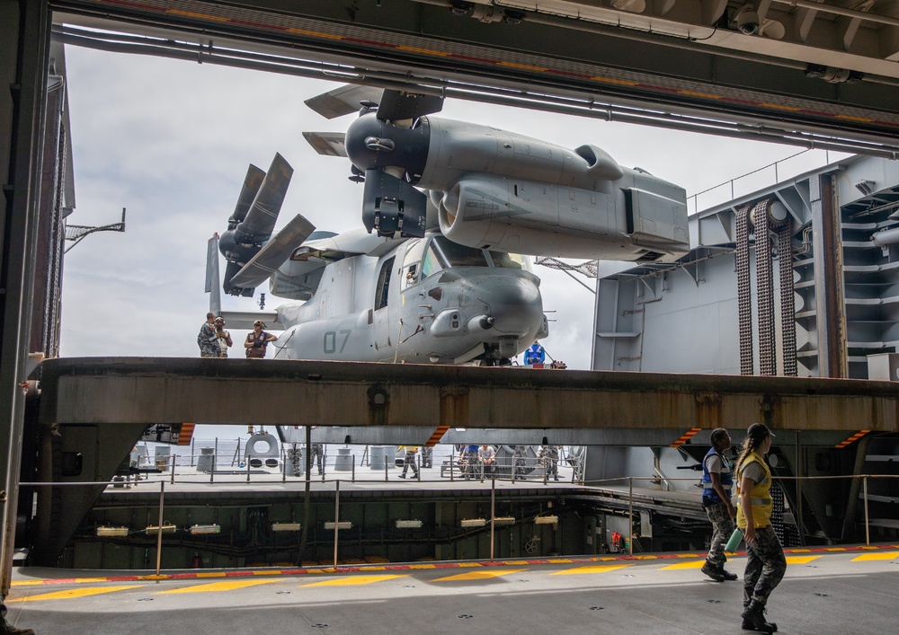 HMAS Canberra stows an Osprey for the first time at sea