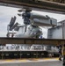 HMAS Canberra stows an Osprey for the first time at sea