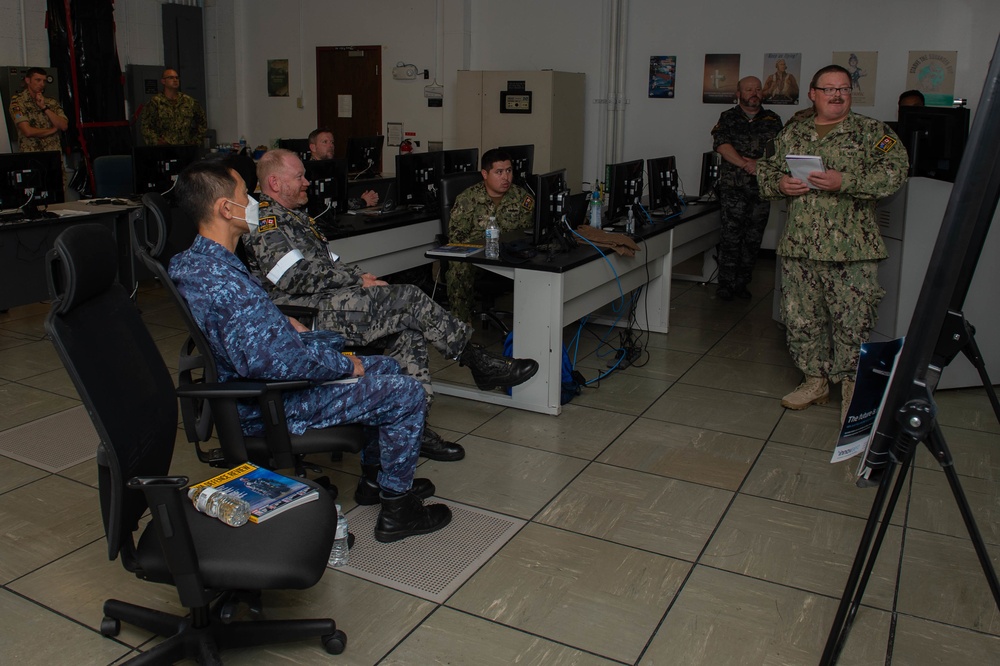 Navy Cooperation and Guidance for Shipping (NCAGS) brief during Rim of the Pacific (RIMPAC) 2022