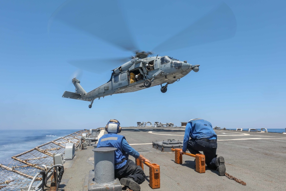 USS Cole Conducts a replenishment at sea with USNS Supply