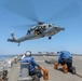 USS Cole Conducts a replenishment at sea with USNS Supply