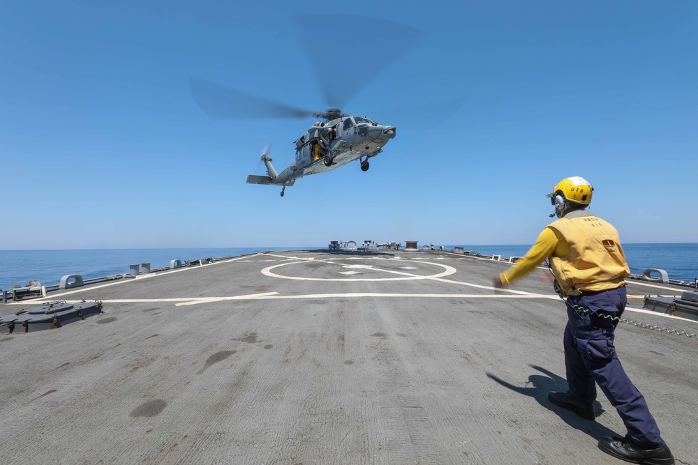 USS Cole Conducts a replenishment at sea with USNS Supply