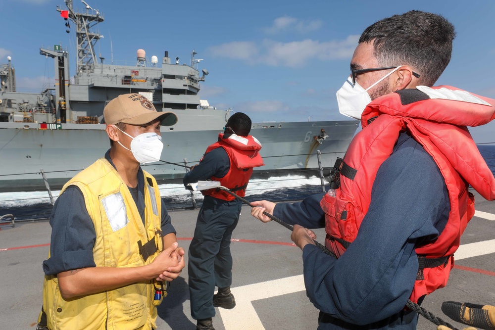 USS Cole Conducts a replenishment at sea with USNS Supply