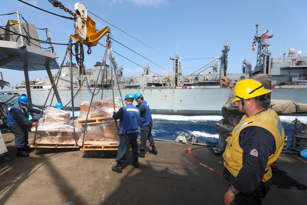 USS Cole Conducts a replenishment at sea with USNS Supply