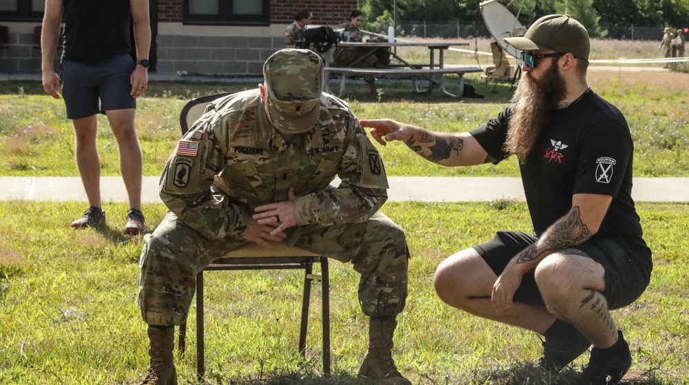 U.S. Army Soldiers conduct flexibility exercises with H2F