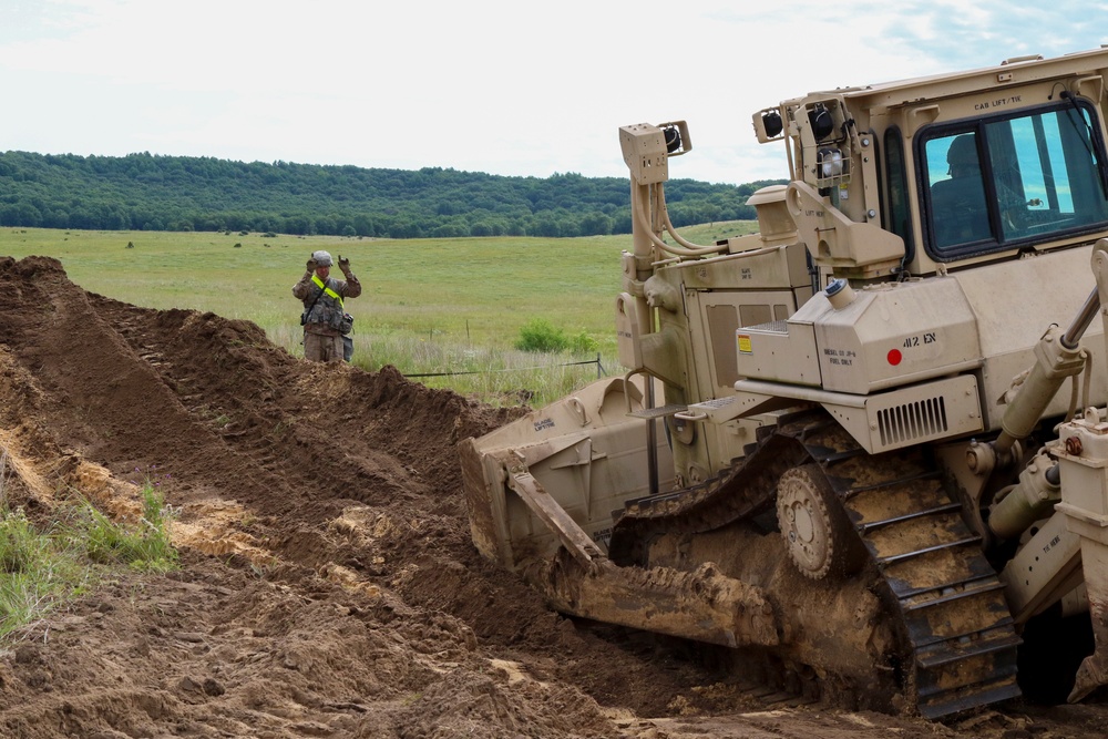 Engineers Dig Fighting Positions at Fort McCoy