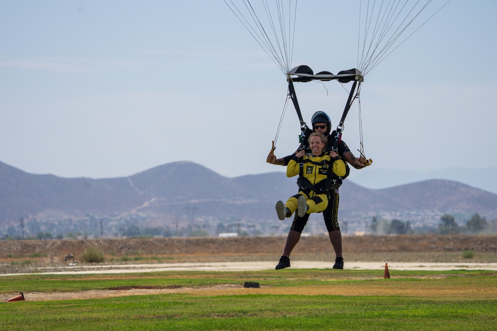 Soldier on U.S. Army Parachute Team takes actress Lucy Martin on tandem skydive