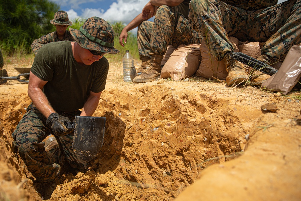 3rd LSB Engineer Support Platoon Marines build defensive positions