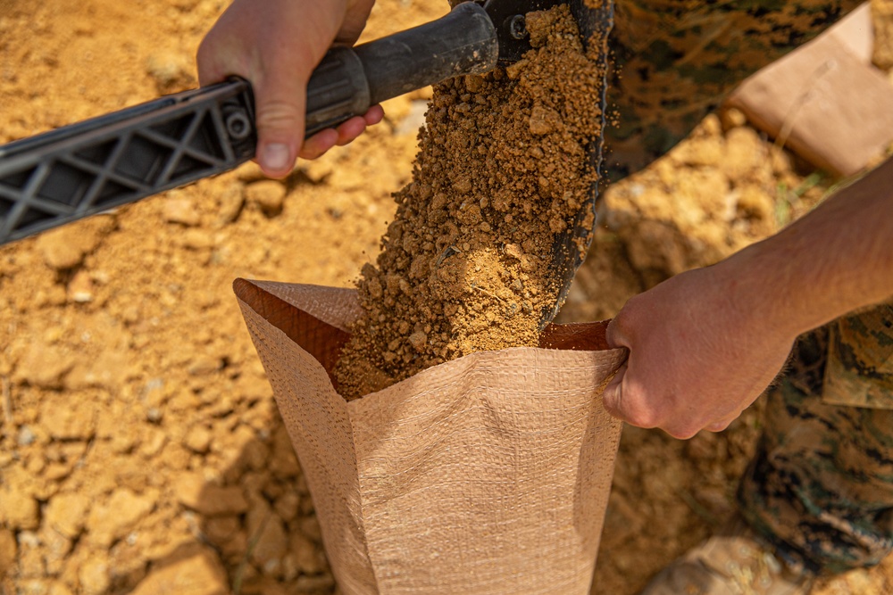 3rd LSB Engineer Support Platoon Marines build defensive positions