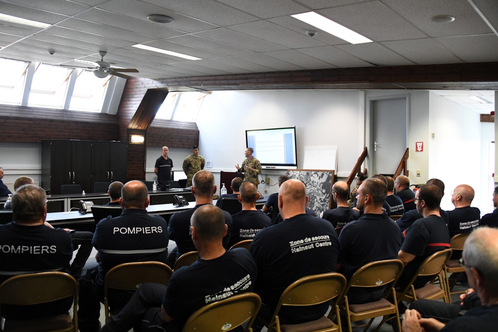 U.S Firefighters, 424th Air Base Squadron, train Belgian Firemen to intervene on an aircraft, Chièvres Air Base, 23 June 2022.