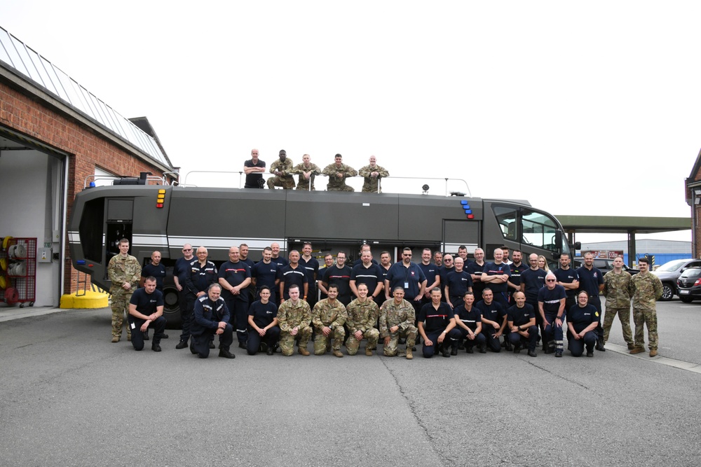 U.S Firefighters, 424th Air Base Squadron, train Belgian Firemen to intervene on an aircraft, Chièvres Air Base, 23 June 2022.