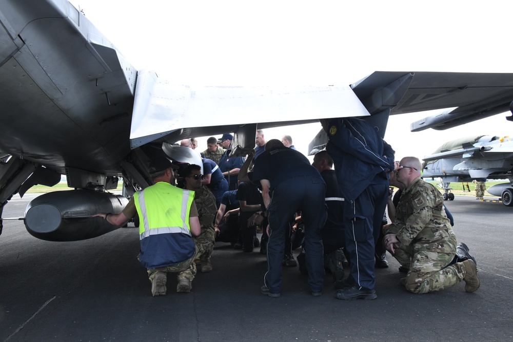 U.S Firefighters, 424th Air Base Squadron, train Belgian Host Nation Firemen to intervene on an aircraft, Chièvres Air Base, 23 June 2022.