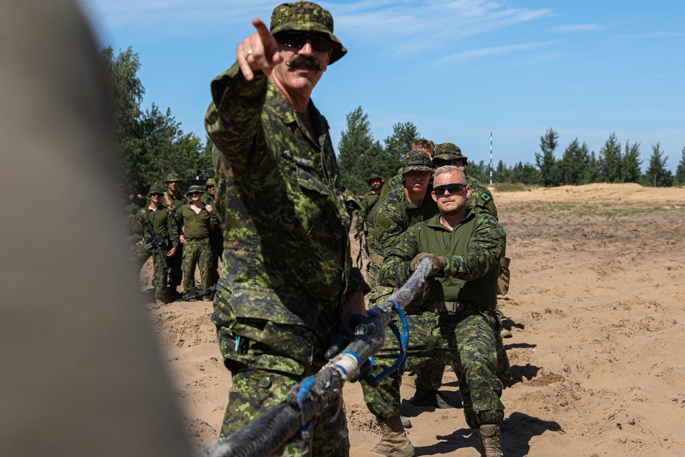 US, Canadian troops play tug of war