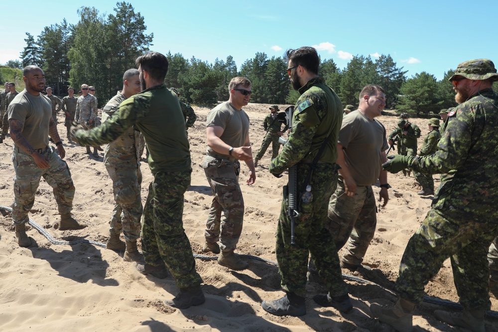 US, Canadian troops play tug of war