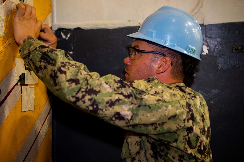 USS Carl Vinson (CVN 70) Sailors Work In-Port