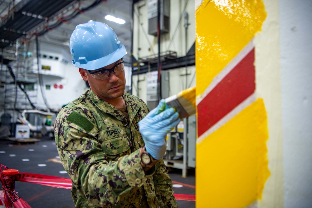 USS Carl Vinson (CVN 70) Sailors Work In-Port