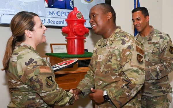 AGB leaders present quarterly awards