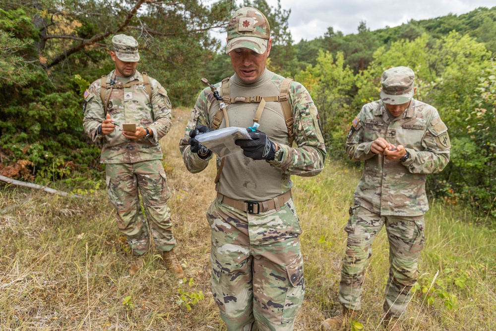 Maj. James Fink orients his map